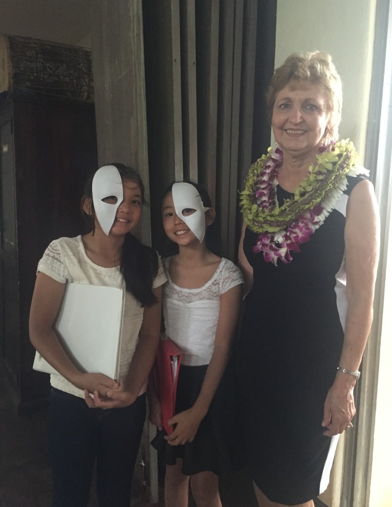 Emalani Ebesu and Mili Fukada getting ready to perform "Phantom of the Opera."